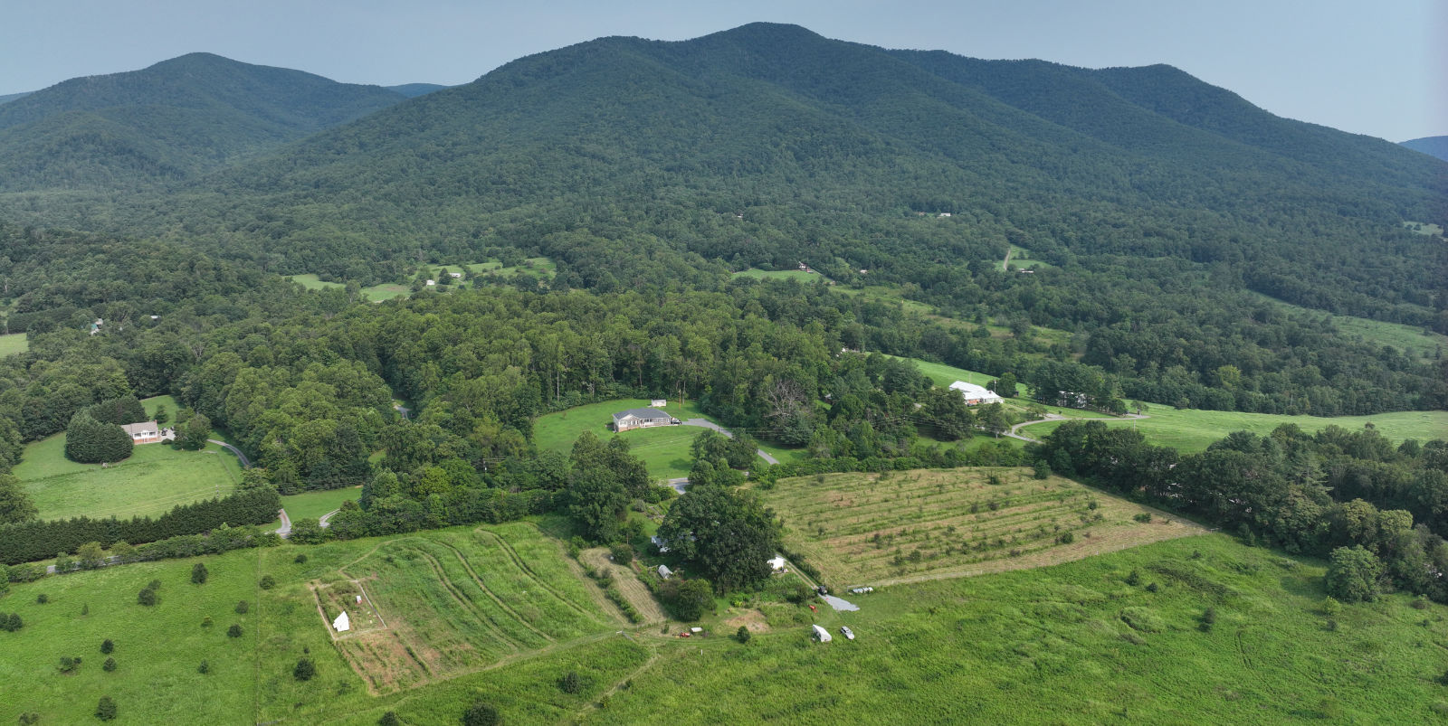 Mountain Run Permaculture from the air, with the Blue Ridge behind it
